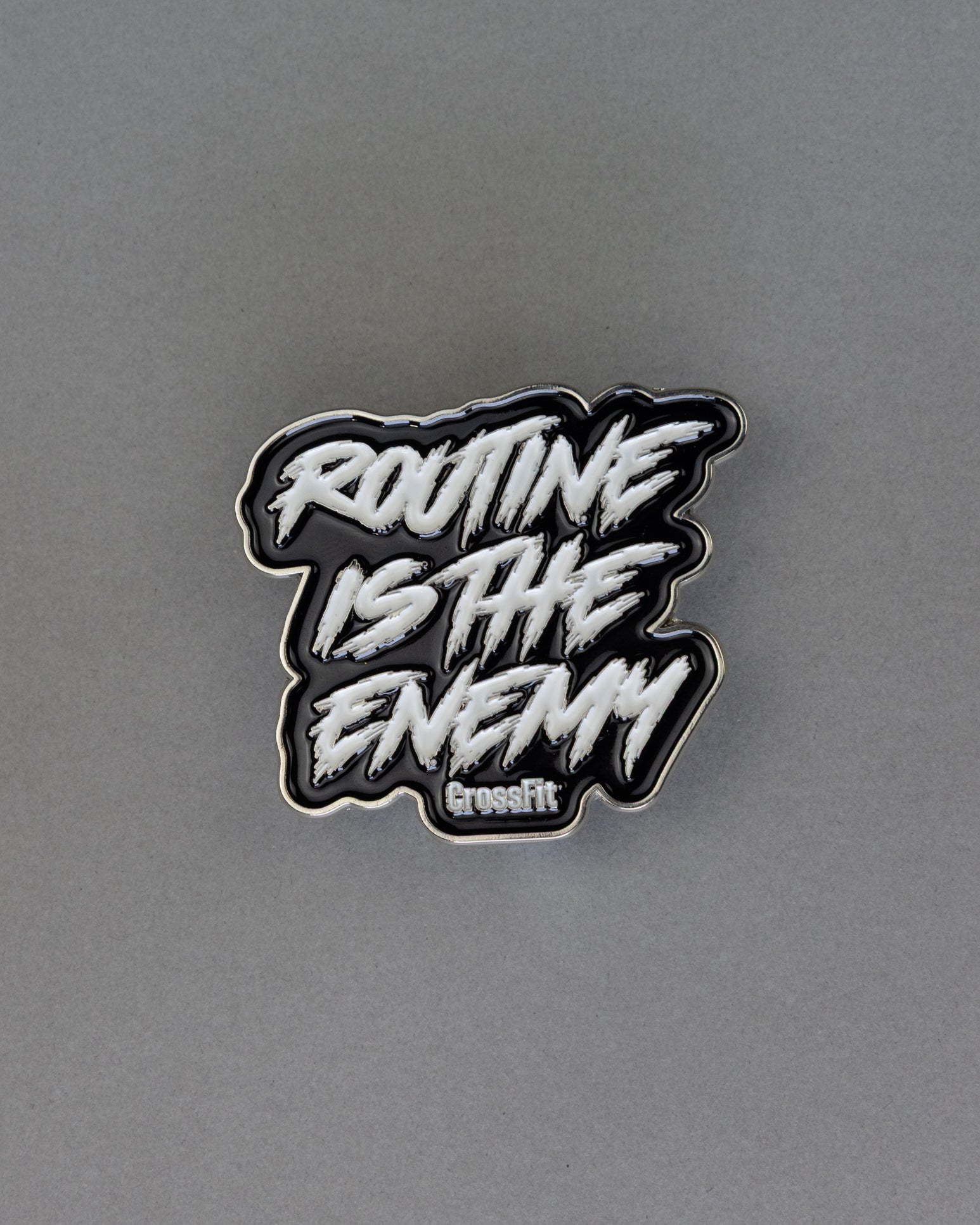 Routine Is The Enemy Enamel Pin