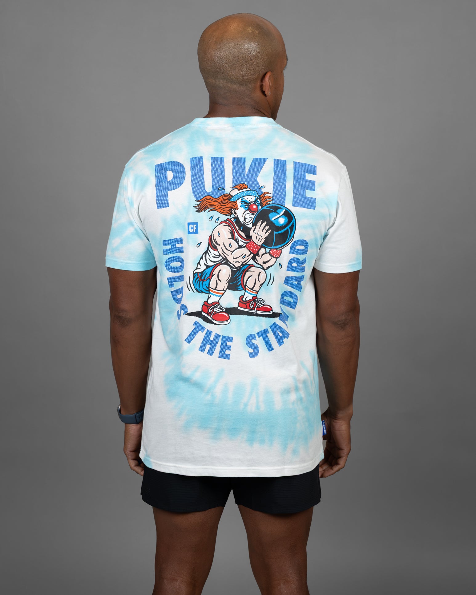 Pukie Holds The Standard Tee